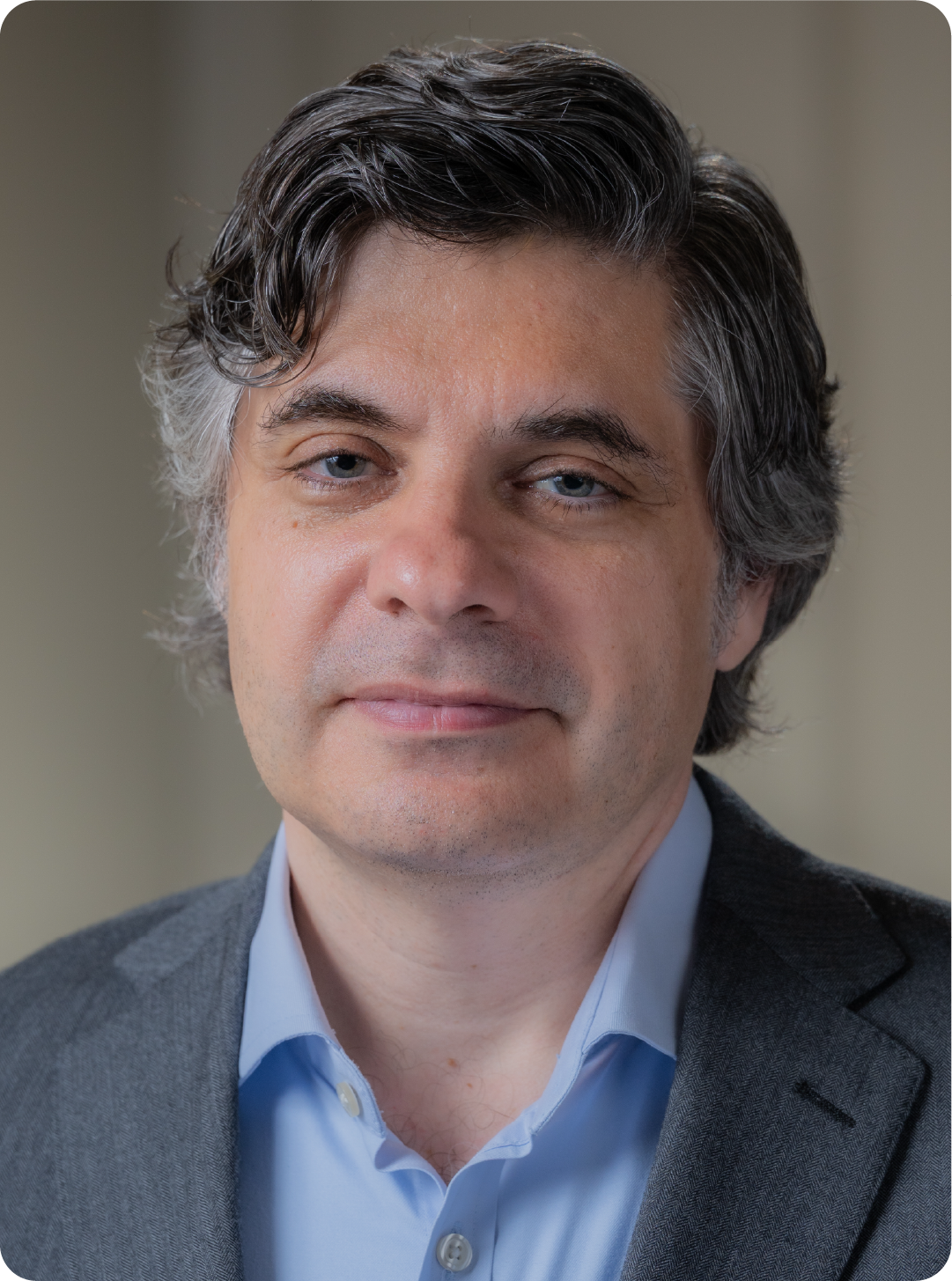 A color photo of a man.