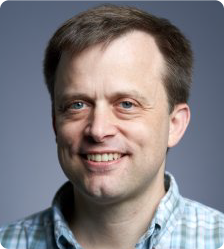 A color photo of a man.