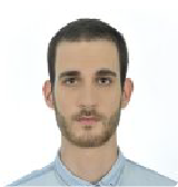 A color photo of a man with a beard and mustache.