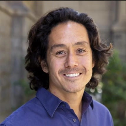 Man smiling for a photo.