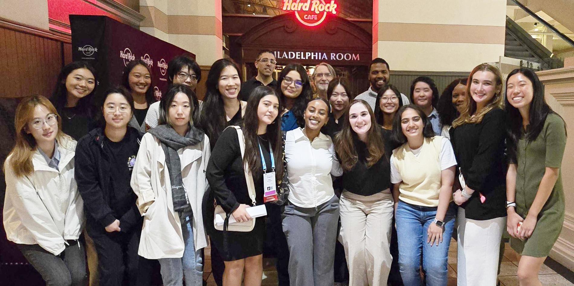 a group of women pose together