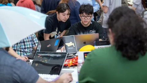 Visitors test drive new games at a previous GDIAC showcase