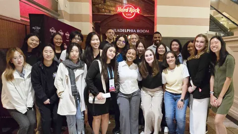 a group of women pose together