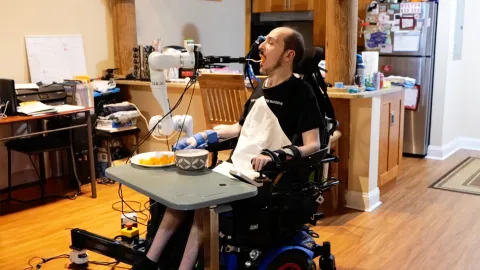 Robotic system feeds people with severe mobility limitations