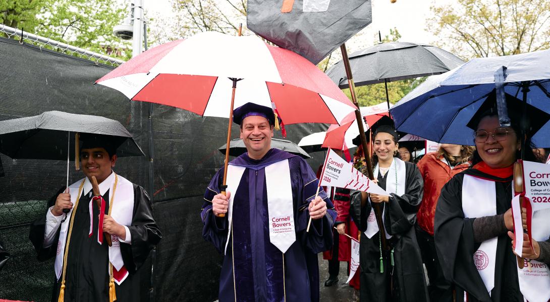 Dean Sorin Lerner walks in the procession with the degree marshals