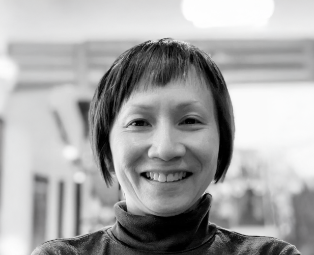 A black and white photo of K.-Y. Daisy Fan, a woman with short dark hair in a turtleneck.