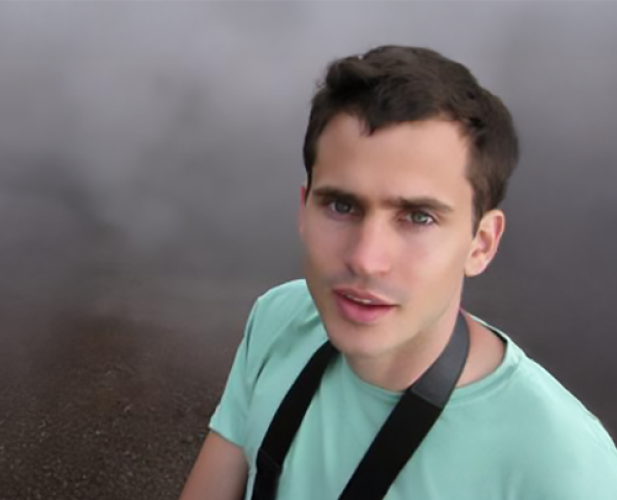 A color photo of Cristian Danescu-Niculescu-Mizil with a foggy background