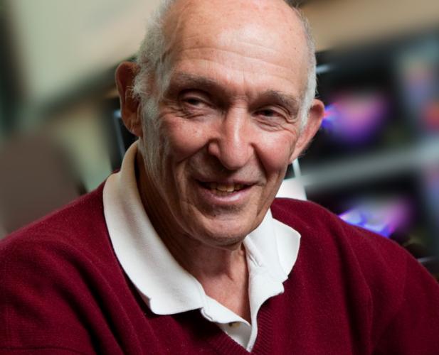 Don Greenberg in red sweater