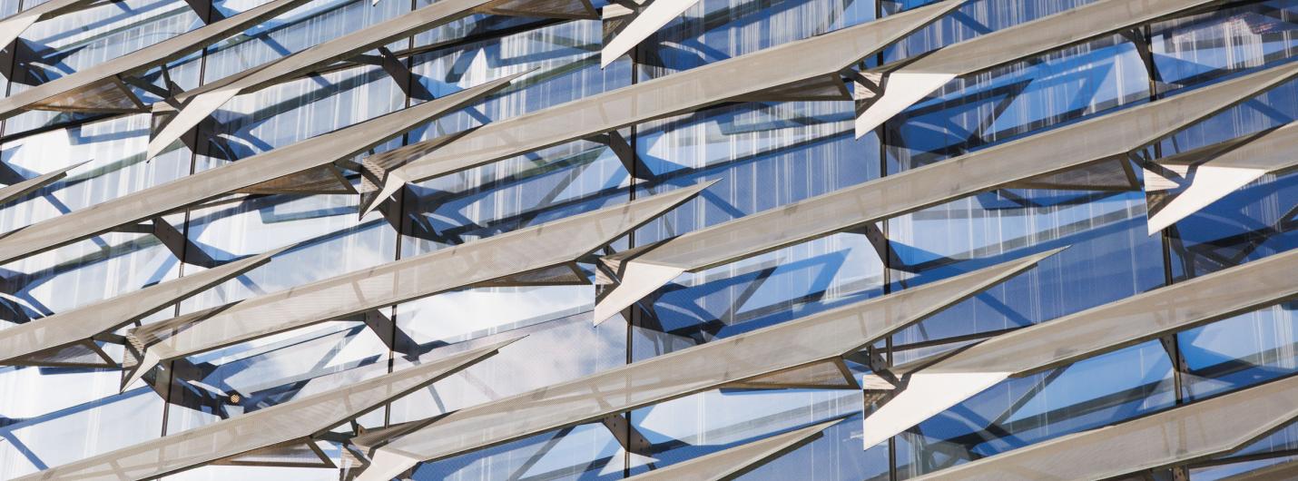 A color photo showing the exterior of Gates Hall.